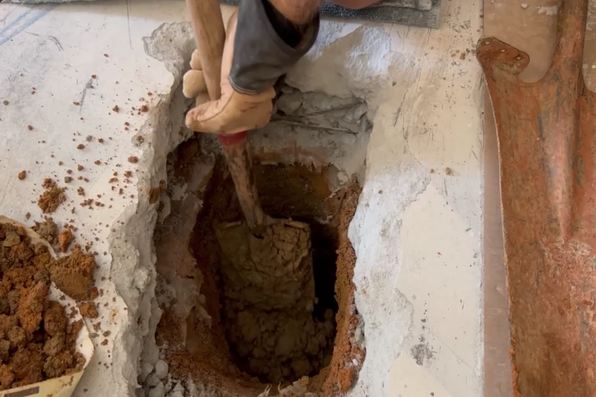 Under-slab plumbing prepared before concrete work