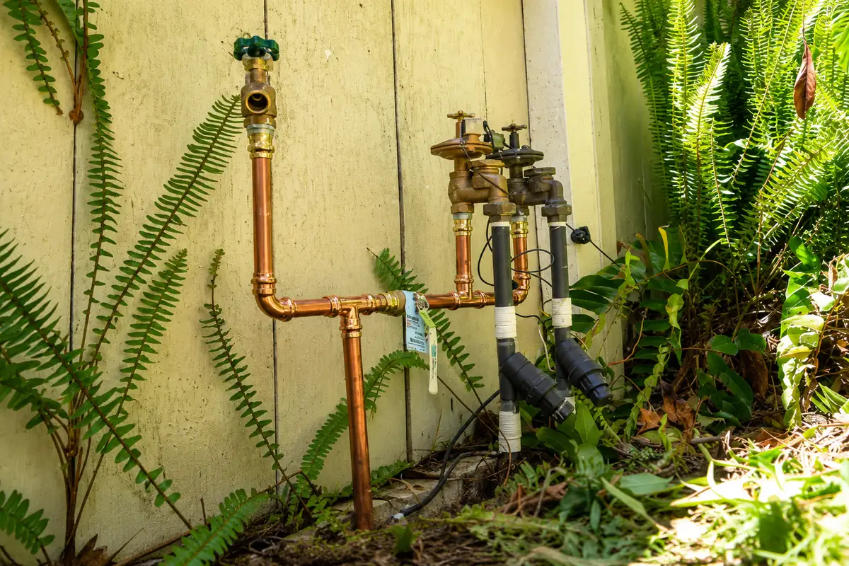 Outdoor plumbing supply lines at an Ojai property